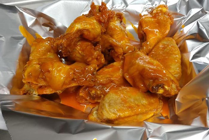 chicken wings wrapped in foil